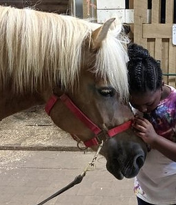 Toots with little girl.jpg