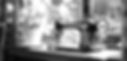 joshuashelton_a_beautiful_sewing_machine_in_the_window_09f0deb8-f41e-495b-8436-030b1266a60