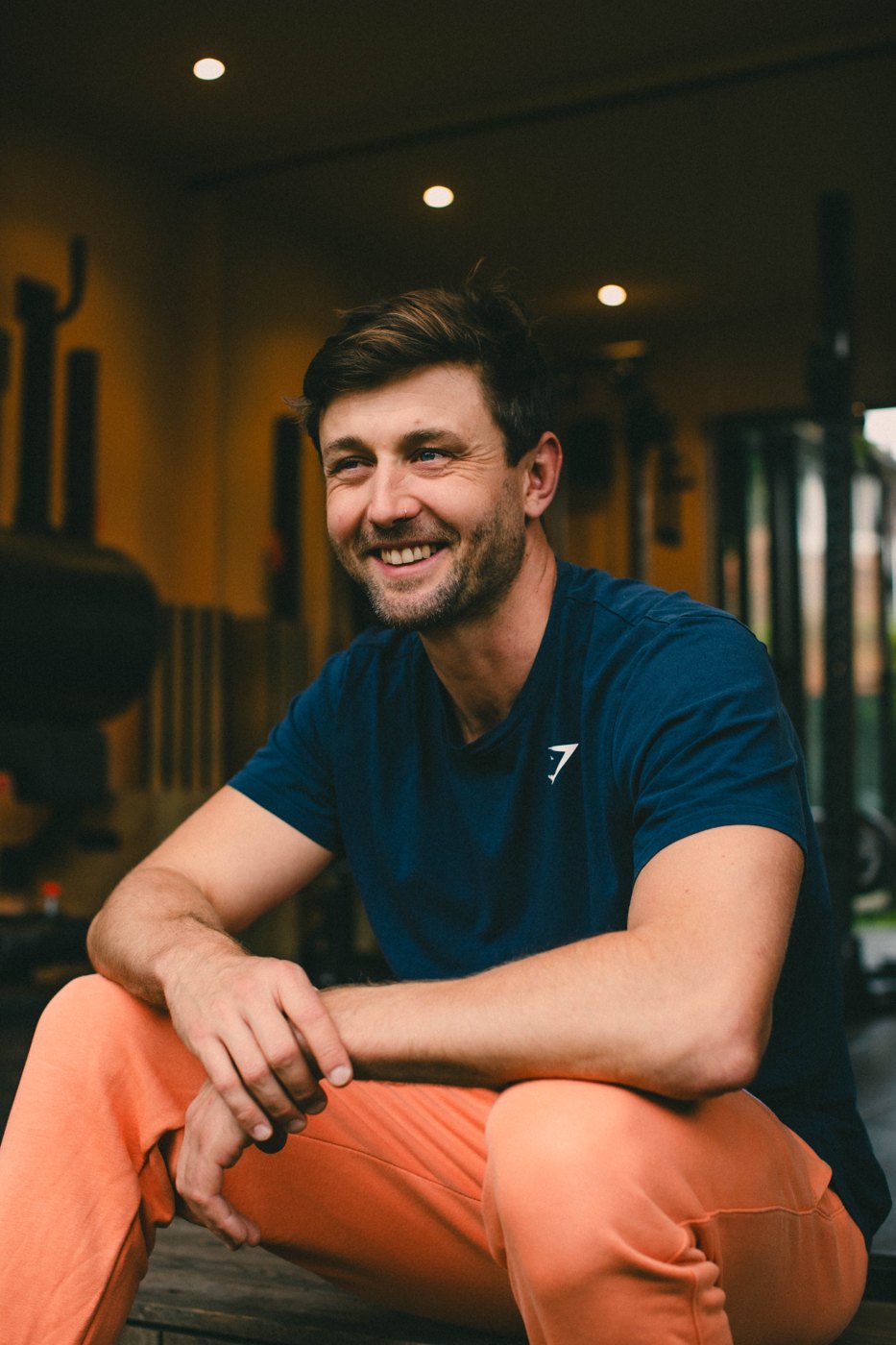 Jack smiling in his garden studio