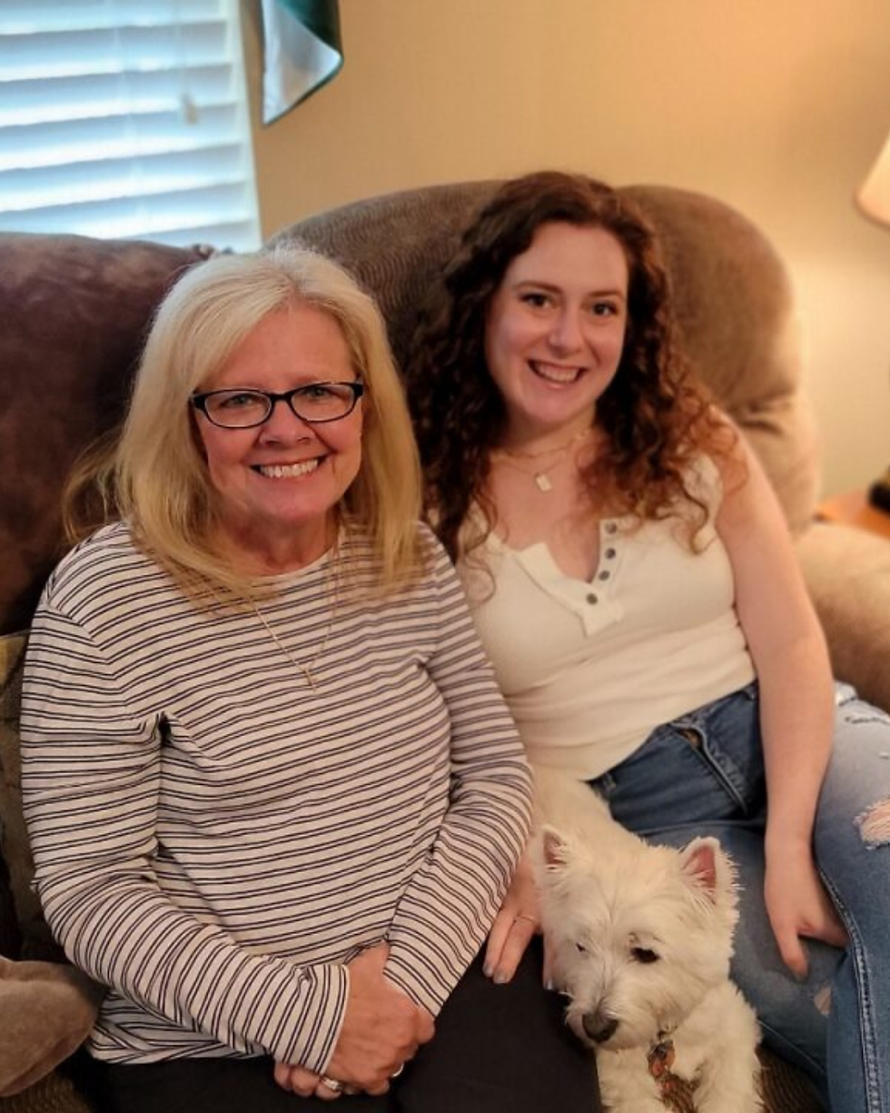 Personal photo of me and my mom sitting together with my dog, representing caregiving and the real life experiences behind Juneberry Apothecary.