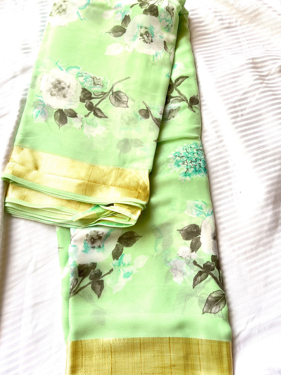 Thumbnail: lemon green georgette saree