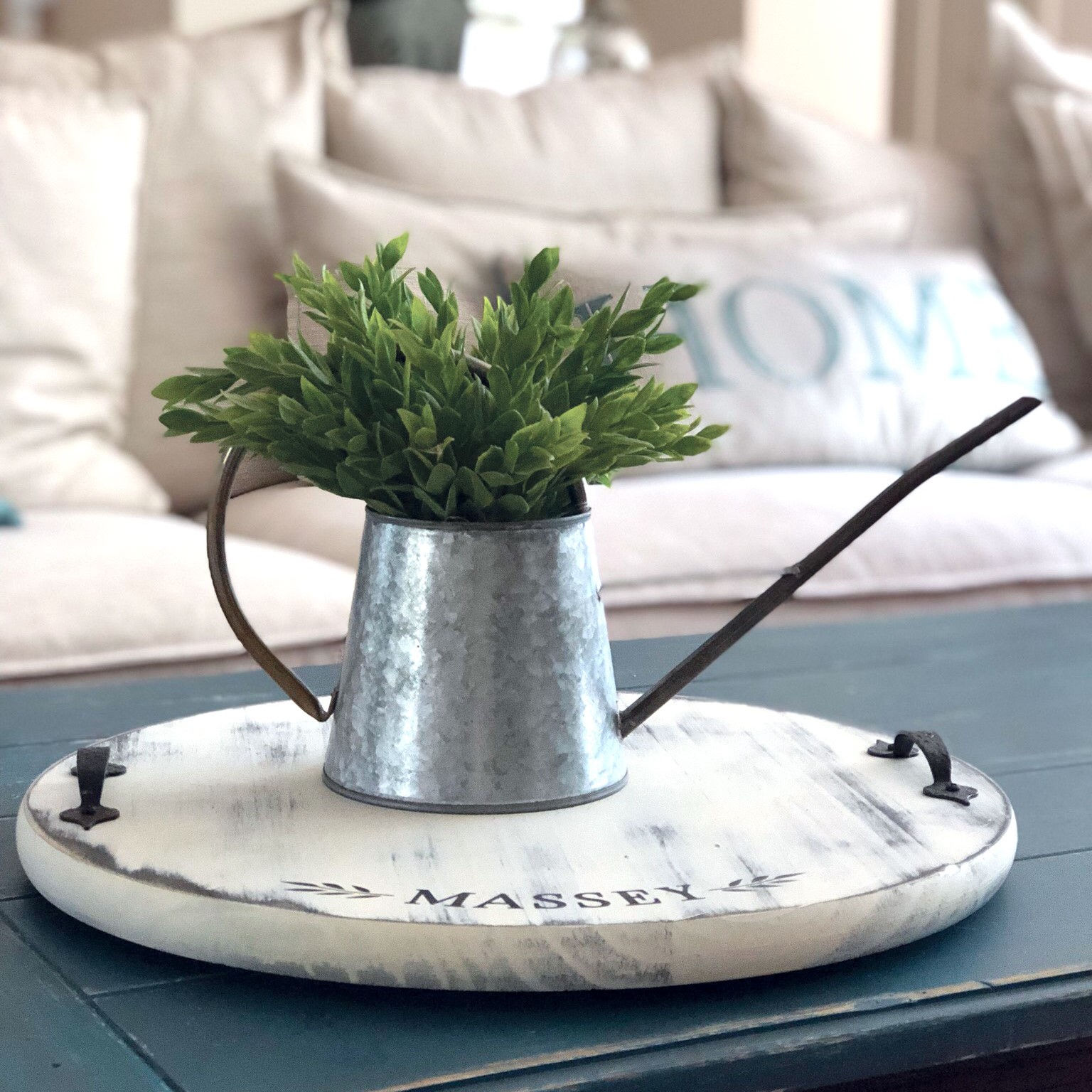 Galvanized zinc planter with faux plant