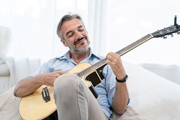 Man playing fingerstyle guitar