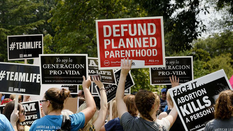 President Trump Listens to Protestor's Cries to Defund Planned Parenthood