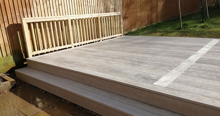 Bridge with balustrade and grey millboard decking