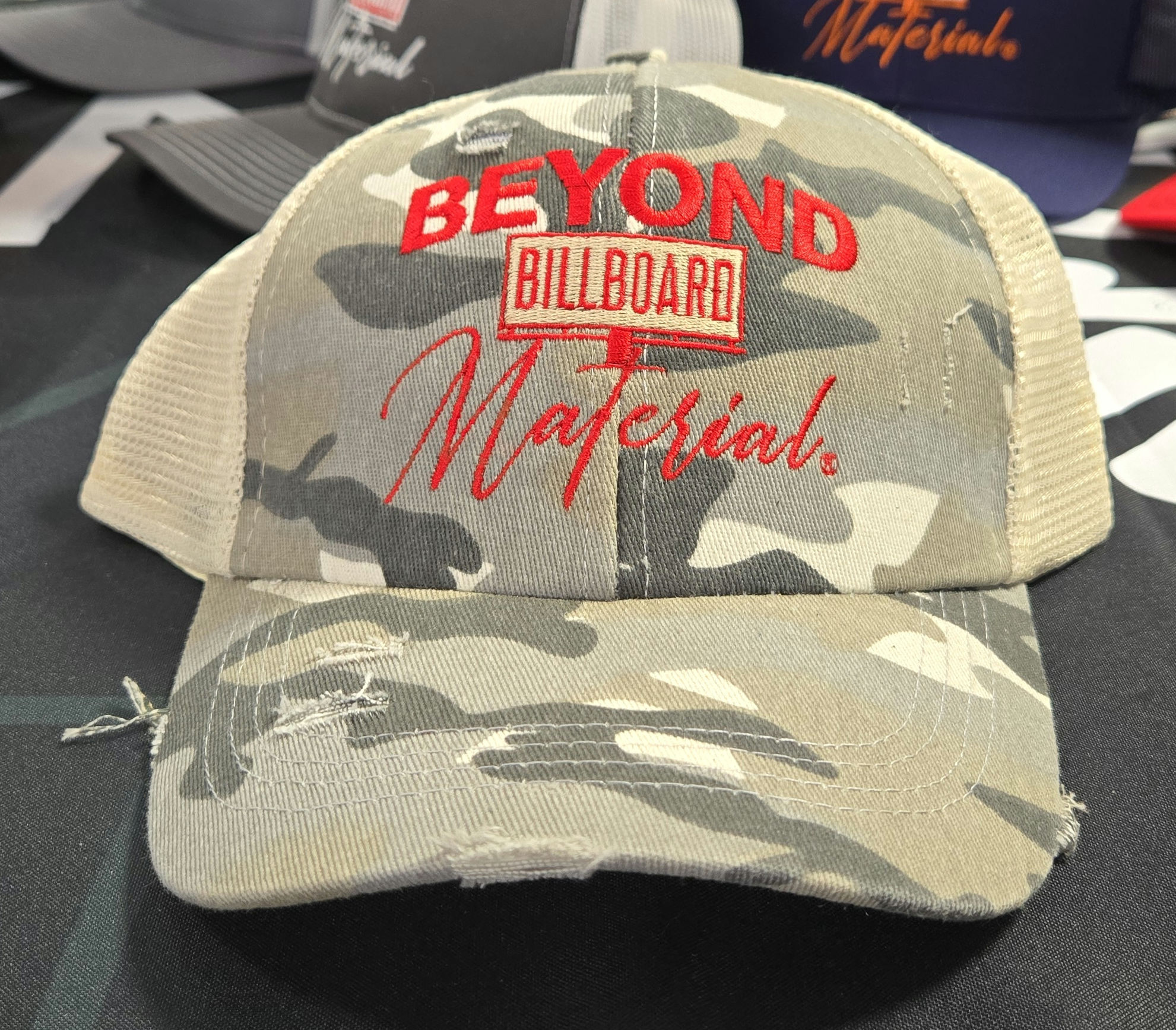 GRAY CAMO W/CREAM MESH W/RED SEW OUT W/CREAM BACK DROP