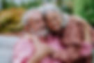 happy-couple-relaxing-together-in-their-garden-2023-11-27-05-19-08-utc.jpg