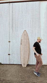 Men with surfboard outside