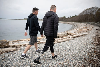 Gay Couple Walking on Beach