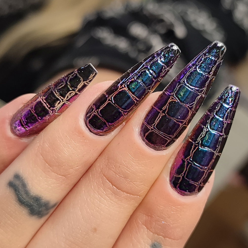 Thumbnail: Vegan, cruelty-free multichrome nail chrome “Sour Grapes,” shimmering with purple, teal, and golden hues.