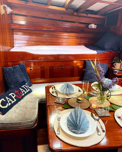 Schooner Rebecca table set for dinner