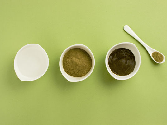 Henna paste and indigo paste in bowls