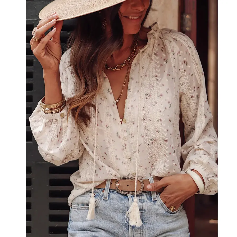 Woman in a patterned summer blouse and straw hat