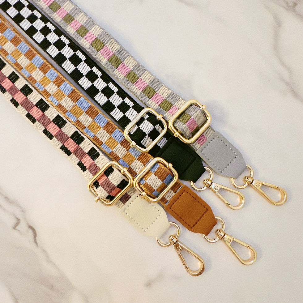 Four woven straps with checkerboard patterns and gold hardware