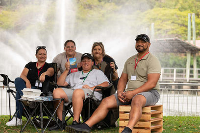 family-in-front-of-fountain-first2care-ndis-plan-support-australia