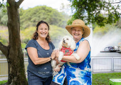 women-holding-dog-first2care-ndis-plan-support-australia