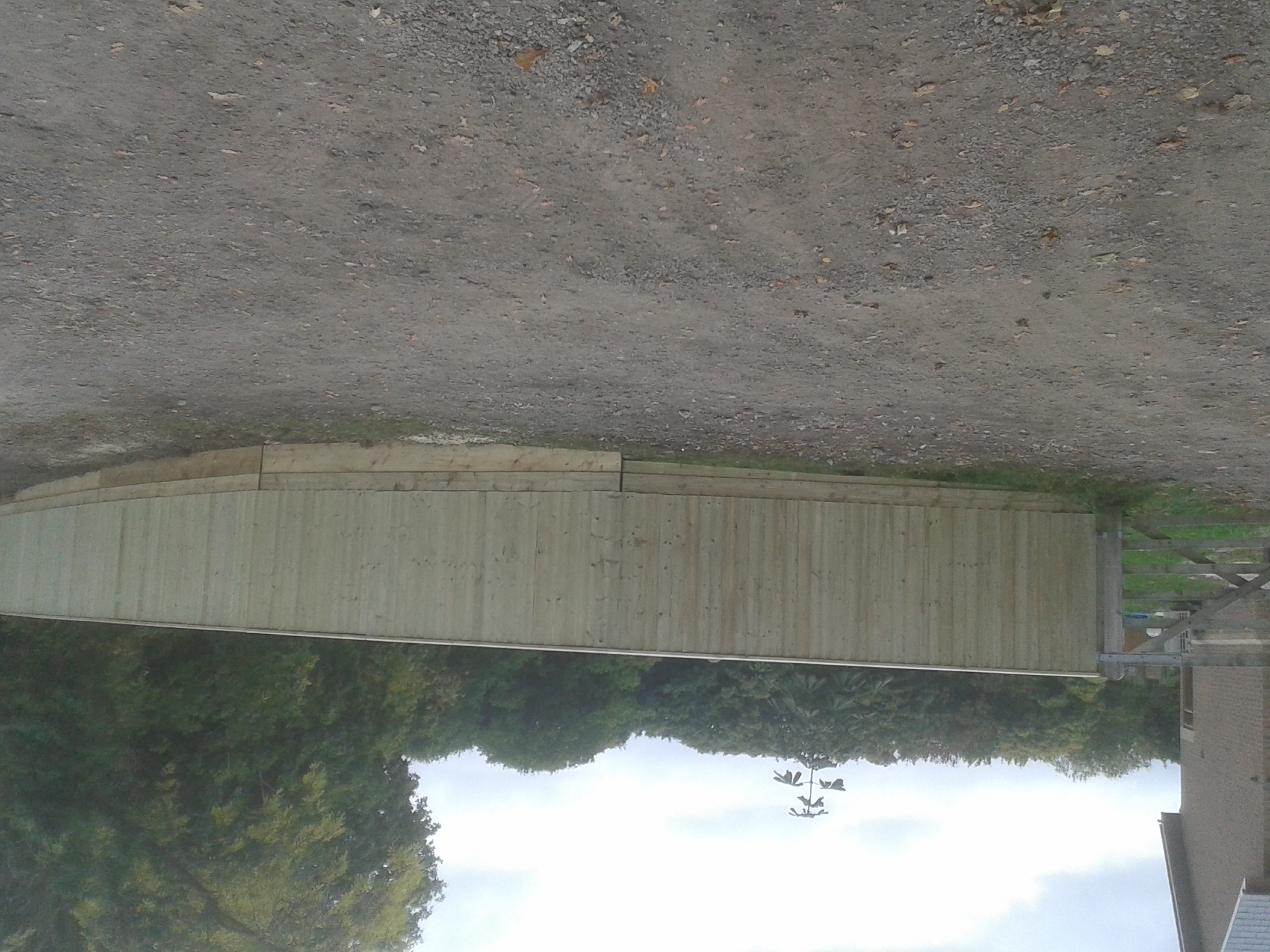 Feather Edge - curved sloping driveway