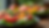 Eye-level view of a colorful Caprese salad with fresh tomatoes and basil