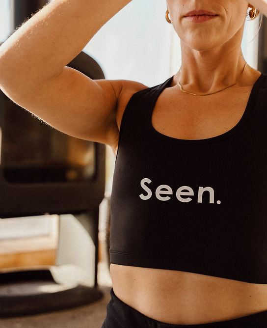 Lily, Holsm yoga coach, practising mindful movement and breathwork for women's wellness