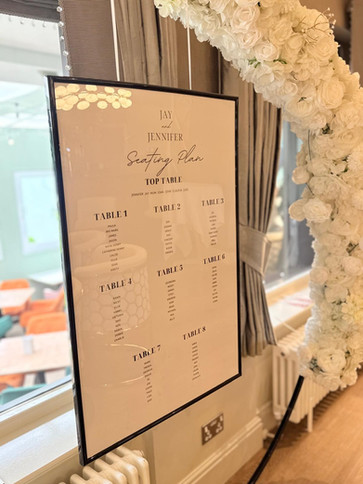 White wedding table plan at thornton hall