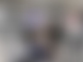 Two guys-one bench pressing, one spotting