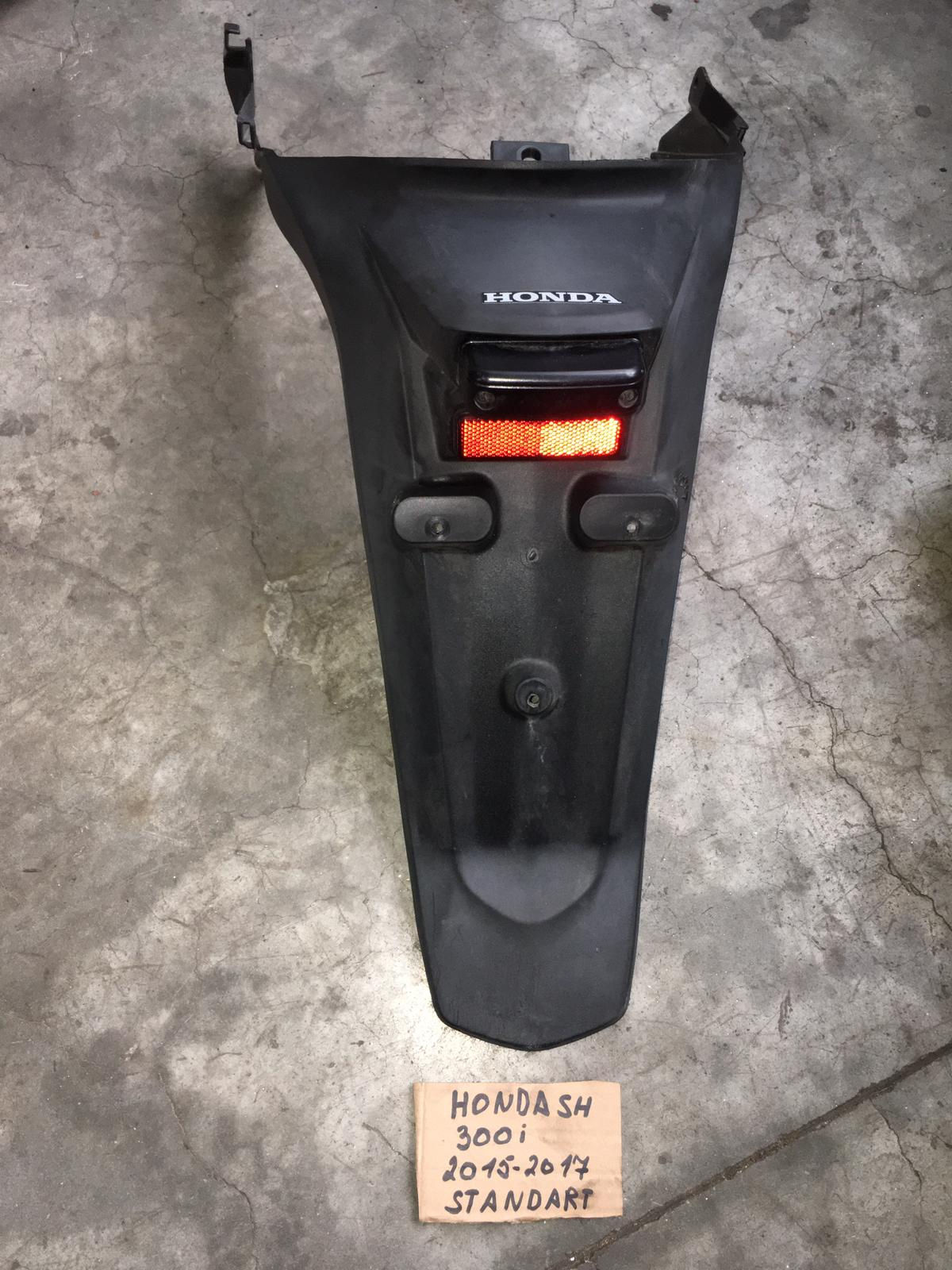 PARAFANGO POSTERIORE PORTA TARGA HONDA SH 300 I 15-17