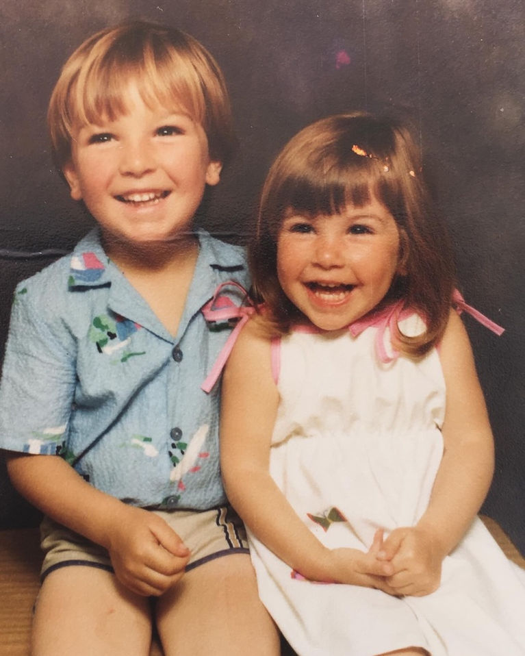Ricky and Alana Cecil smiling together in a childhood photo.