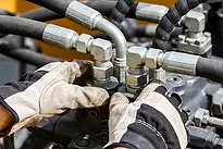 Hydraulic hose connections being serviced by PSI Hydraulics
