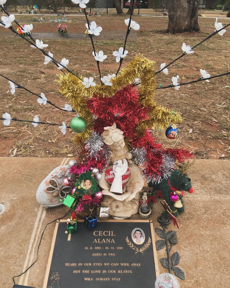 Alana Cecil's grave site with her memorial stone.
