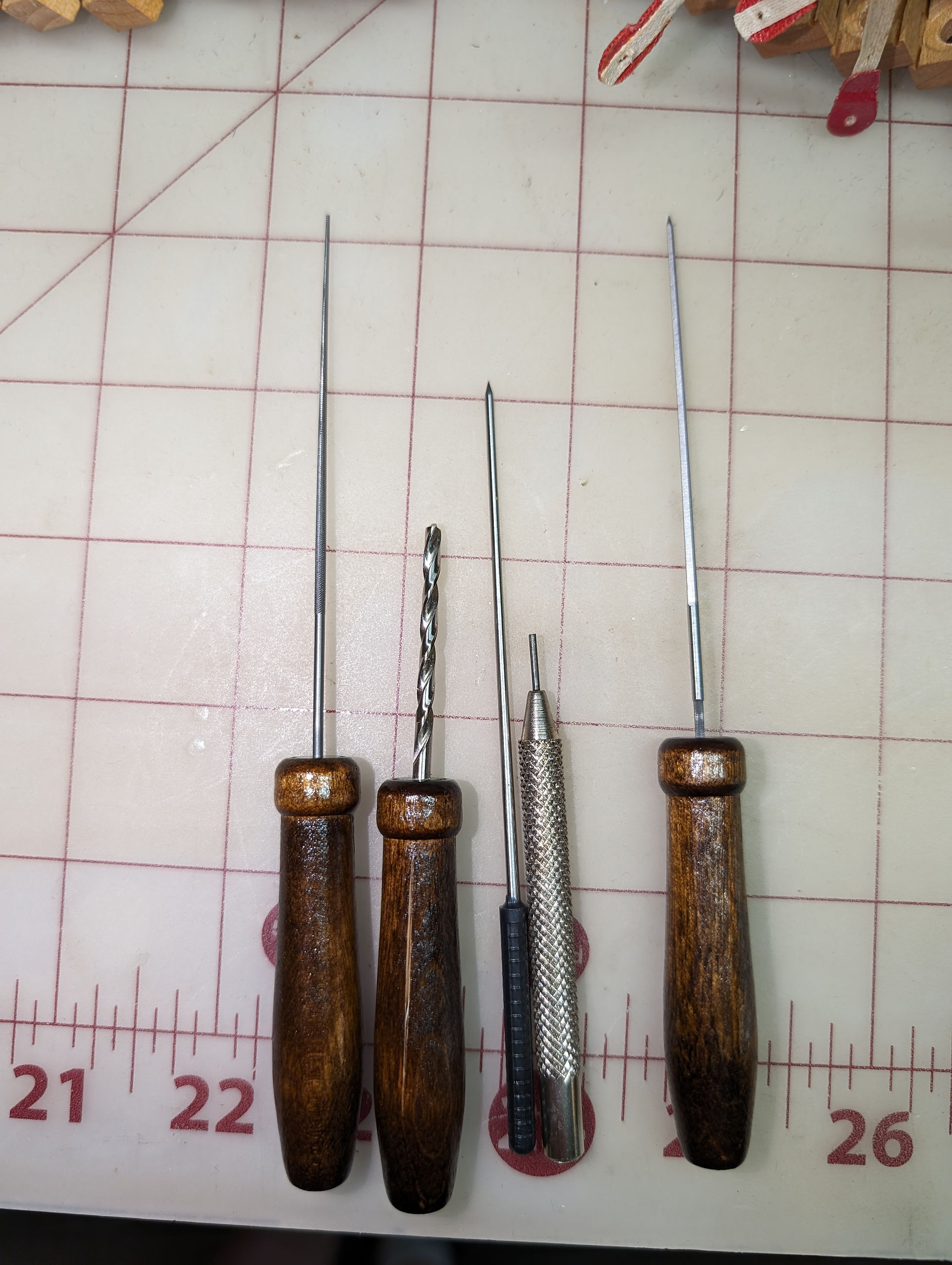 A set of tools for repinning, burnishing, and replacing piano flange felt