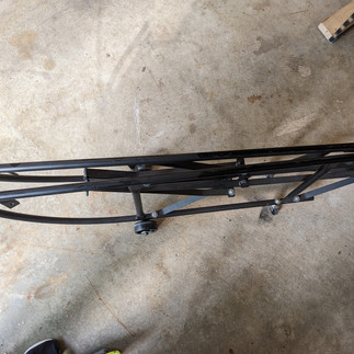 A folded piano tilter