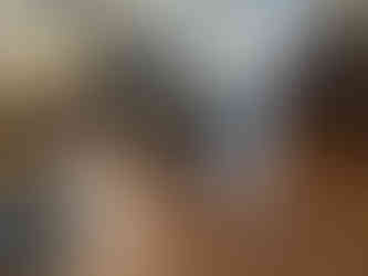 A black Knabe grand piano inside a piano workshop