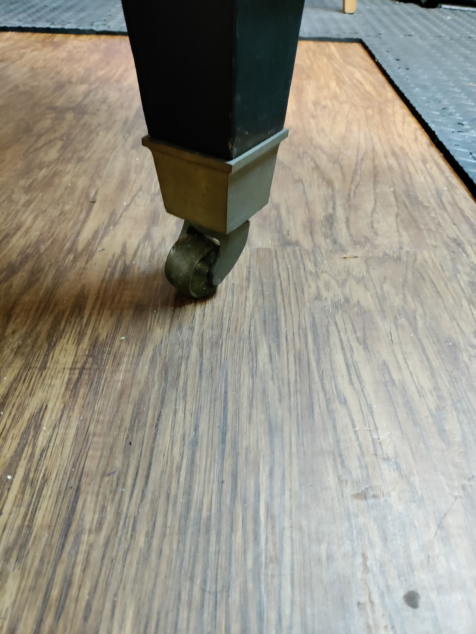 A grand piano leg