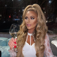 Woman drinking wine.JPEG
