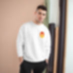 man wearing white sweatshirt with statement wear joy in the morning