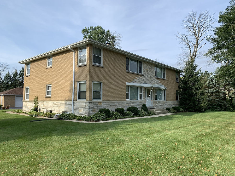 Rental home exterior, two story brick building