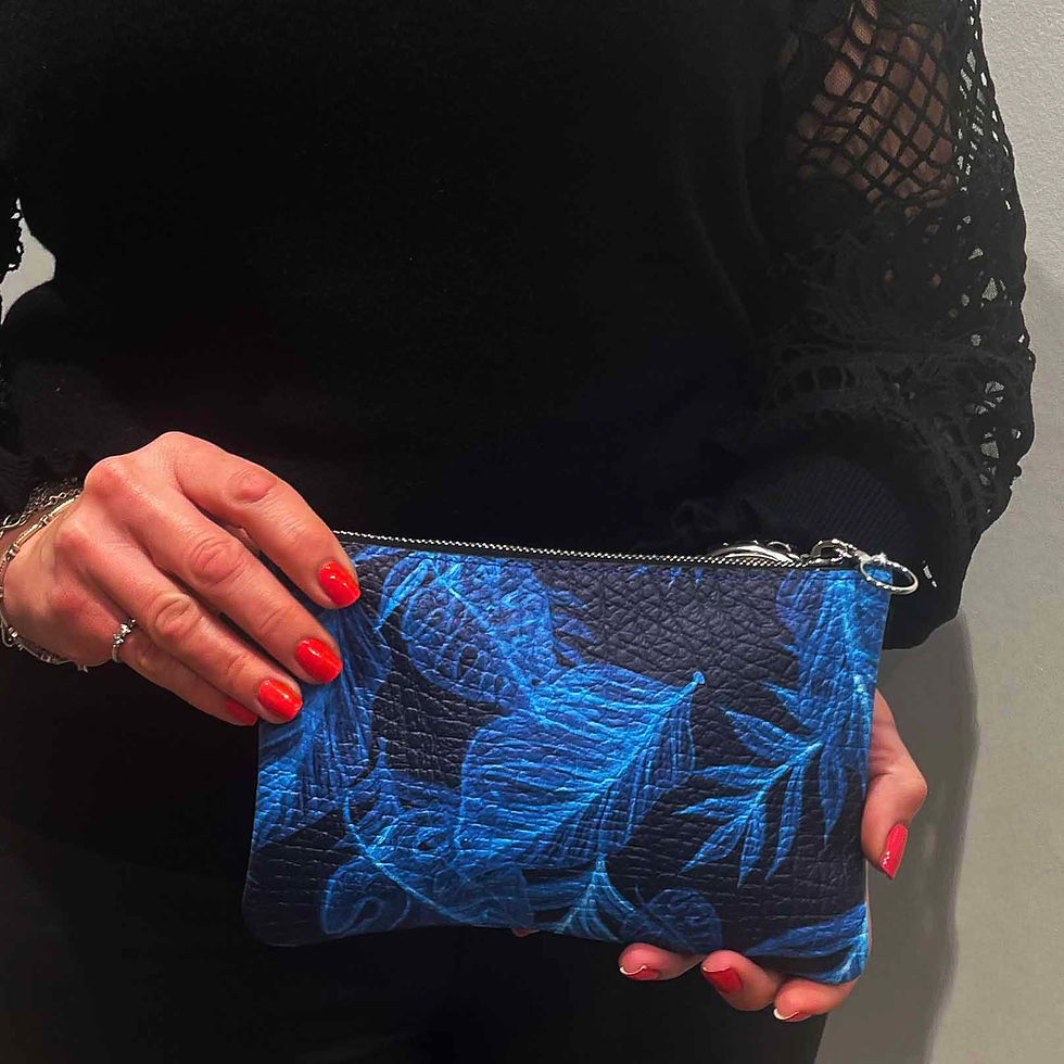 Thumbnail: Napa leather clutch bag, small held by a model