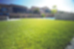 Close-up view of lush artificial turf in a residential garden
