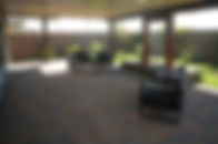 Paver patio with water feature and seating area