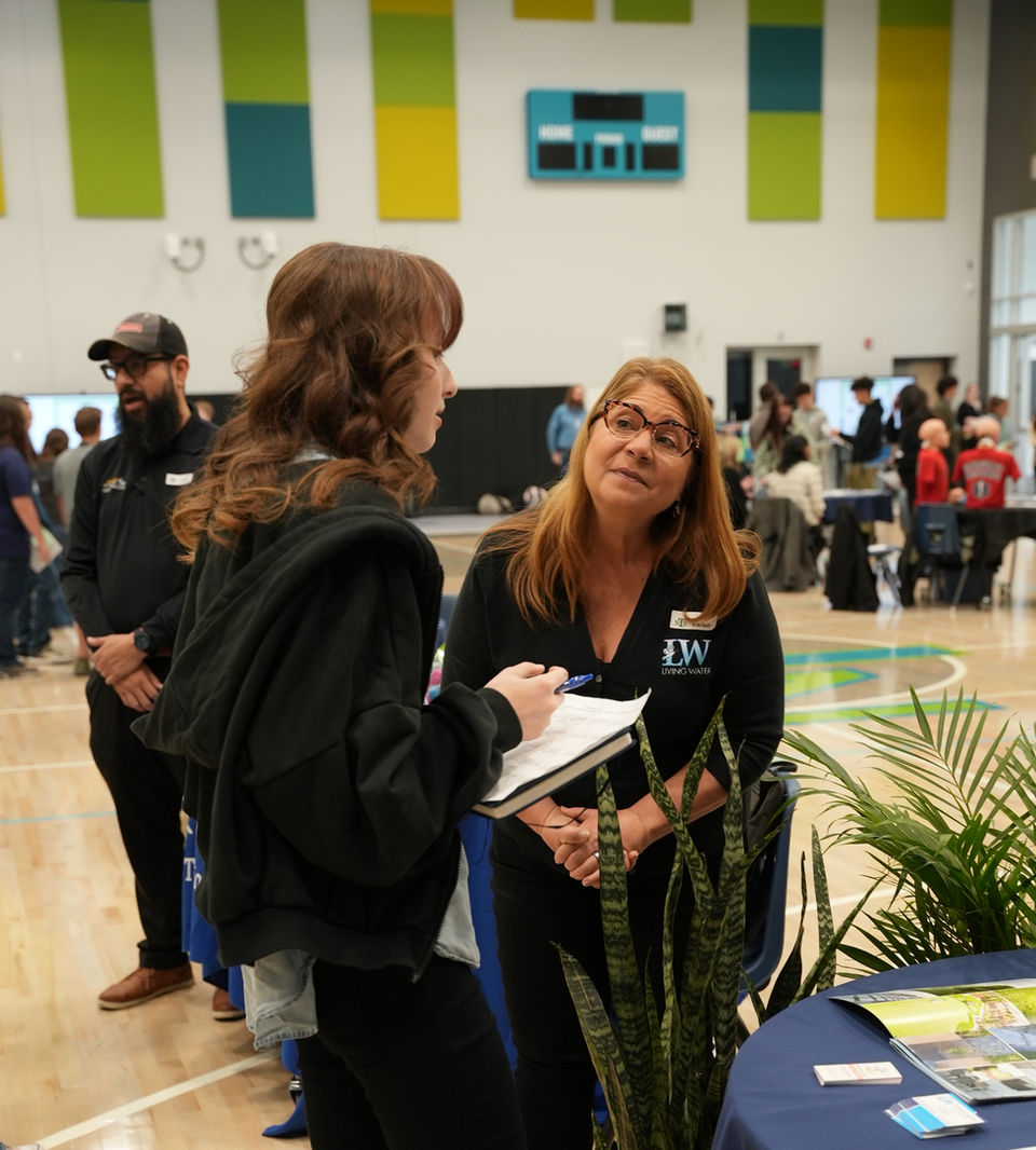 Martha speaking to an interested student