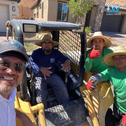 Mark Mcloone and the staff at work in the bobcat
