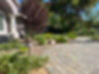 pavers laid in a curve on driveway