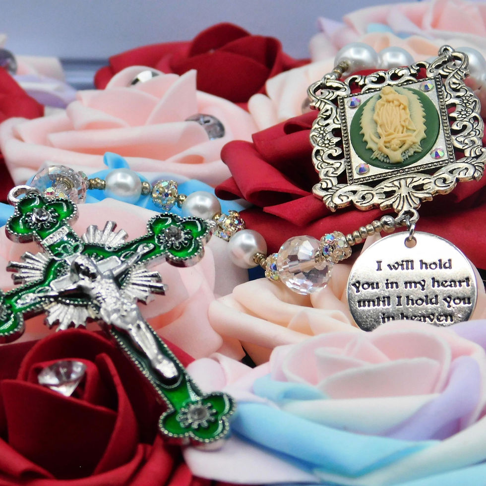 Thumbnail: Elegant white pearl rosary featuring a green enamel crucifix, an ornate Our Lady of Guadalupe Center, and heartfelt memorial