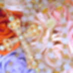 Luxury handmade white and gold rosary featuring elegant gemstone beads, sparkling crystal accents, and ornate gold cross