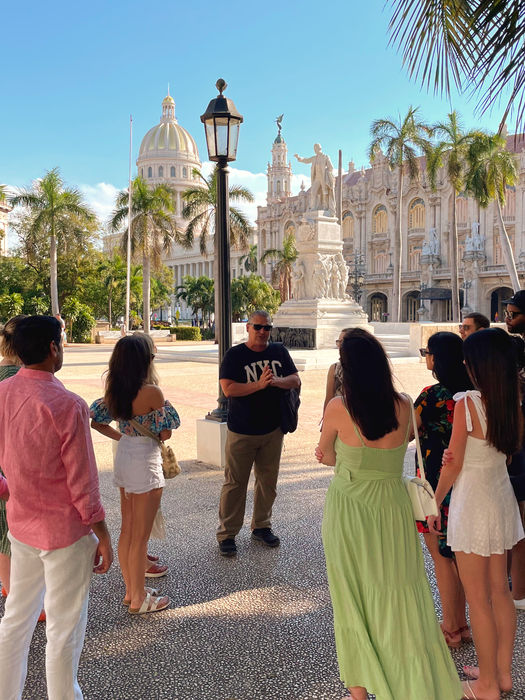 tour group listening to guide in Plaza de la Revolución