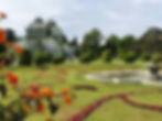 Glass Palm House and manicured gardens at Schönbrunn Palace in Vienna on FTLO's group trip