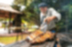 Traditional Argentine gaucho grilling asado barbecue outdoors