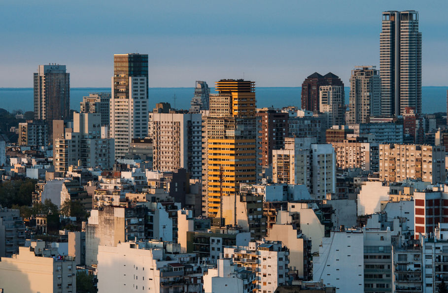 Skyline of Buenos Aires with high-rise buildings and the Rio de la Plata in the distance – FTLO Travel Argentina trip