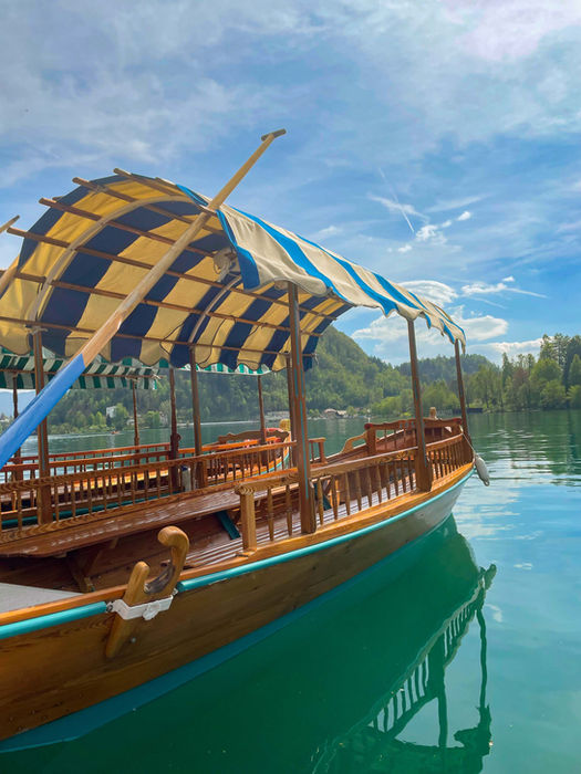 Traditional wooden pletna boat on Lake Bled, Slovenia.