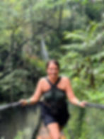 a solo traveler on a bridge in the Costa Rican jungle